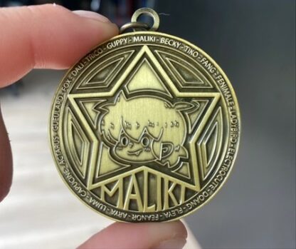 Médaille collector - face Maliki